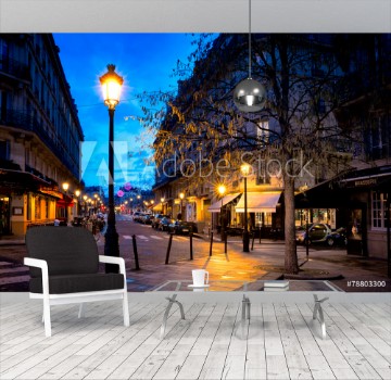 Bild på Paris beautiful street in the evening with lampposts